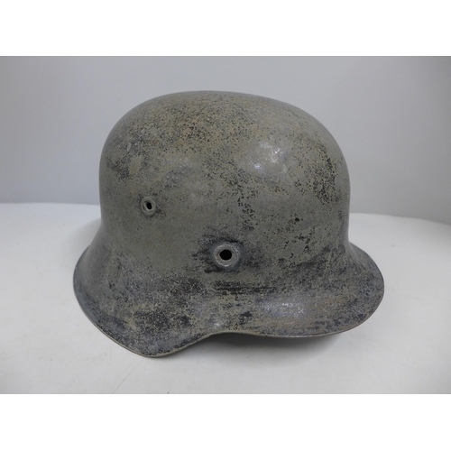 714 - A German WWII SE64 helmet shell, EF64, lot 338