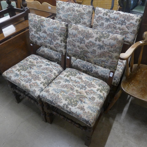 213 - A set of four oak dining chairs