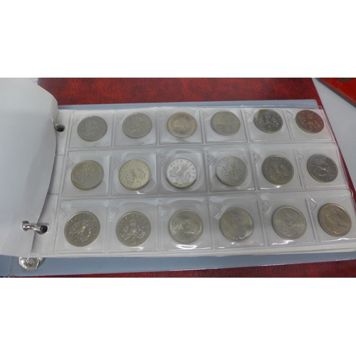 725 - A collection of GB coin sets and an album of coins