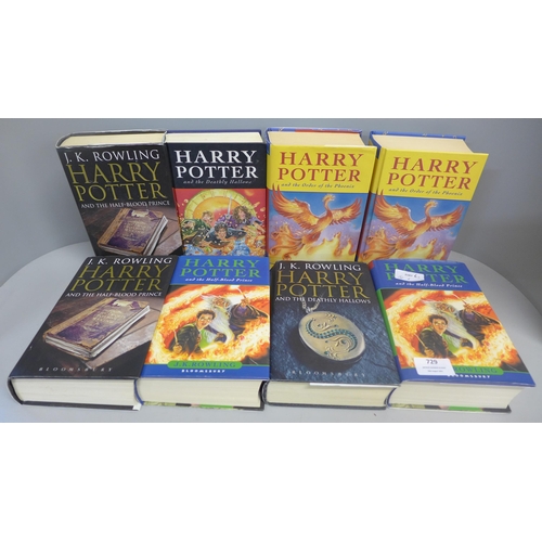 729 - Eight first edition Harry Potter books