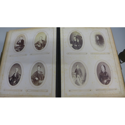 739 - A Victorian album of carte de visite and cabinet cards