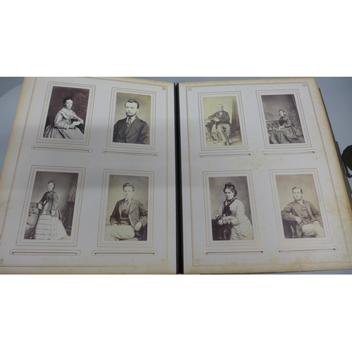 739 - A Victorian album of carte de visite and cabinet cards