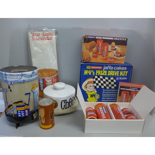 755 - A collection of McVitie's items, two Jaffa Cake revolving lamps, a Digestive breakfast set, a Prize ... 