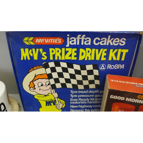 755 - A collection of McVitie's items, two Jaffa Cake revolving lamps, a Digestive breakfast set, a Prize ... 