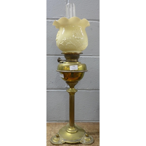 772 - A brass oil lamp