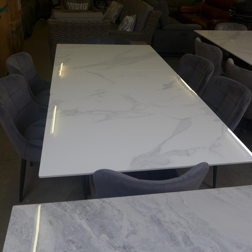 1388 - A marble effect extending dining table with a set of six Kos graphite velvet pinched back dining cha... 