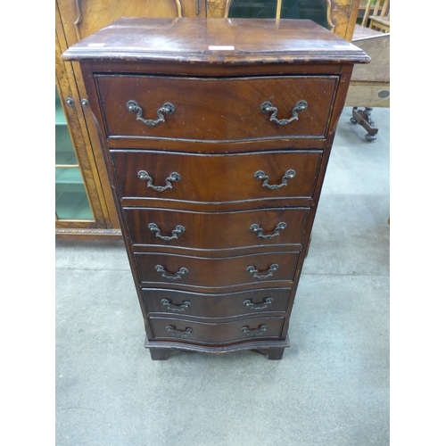 117 - A mahogany serpentine chest of drawers