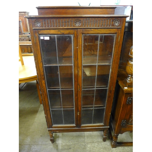 119 - An early 20th Century oak two door bookcase