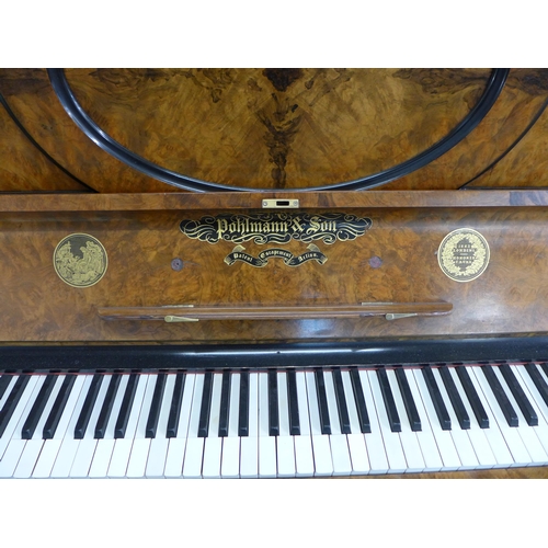 122 - A Victorian burr walnut Pohlmann & Son, Patent Escapement Action overstrung upright piano. With non-... 