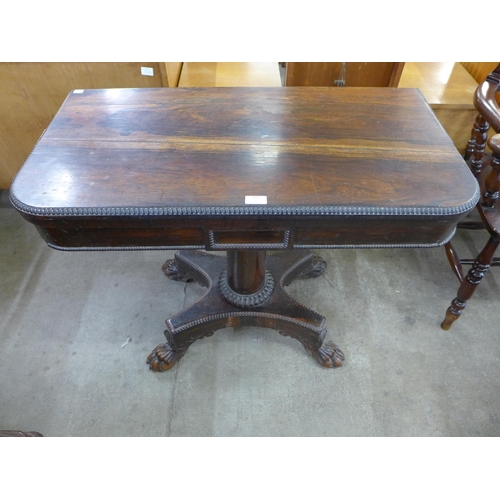 127 - A Regency rosewood D-shaped fold over card table