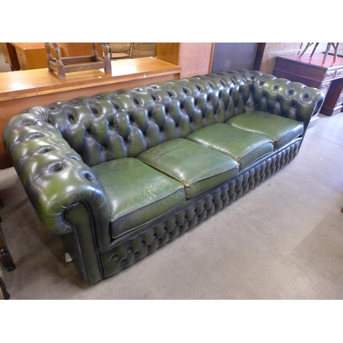 143 - A green leather Chesterfield settee