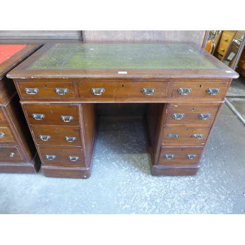 146 - A Victorian oak pedestal desk