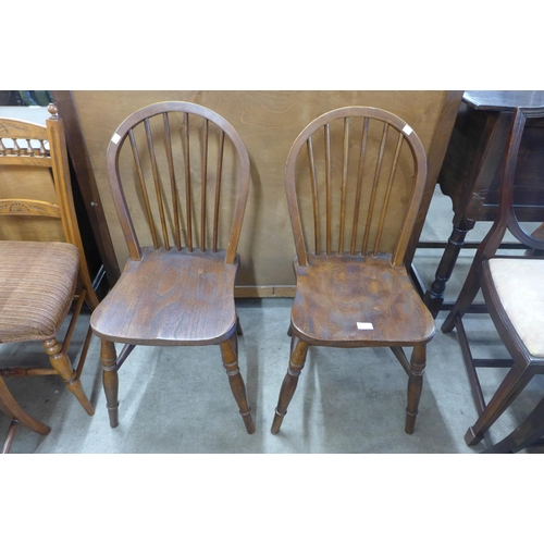 178 - A pair of elm and beech Windsor kitchen chairs