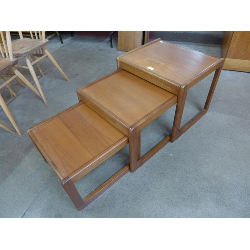 18 - A teak nest of tables