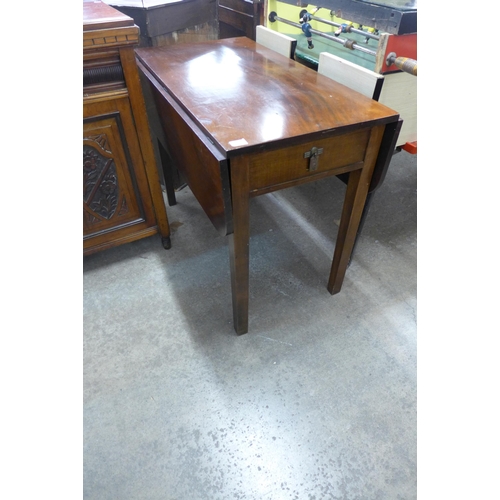 198 - A Victorian mahogany hallstand, a sideboard and a drop-leaf table