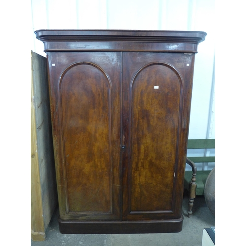 200 - A Victorian mahogany two door wardrobe