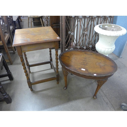 209 - An oak barleytwist occasional table and an oval walnut coffee table