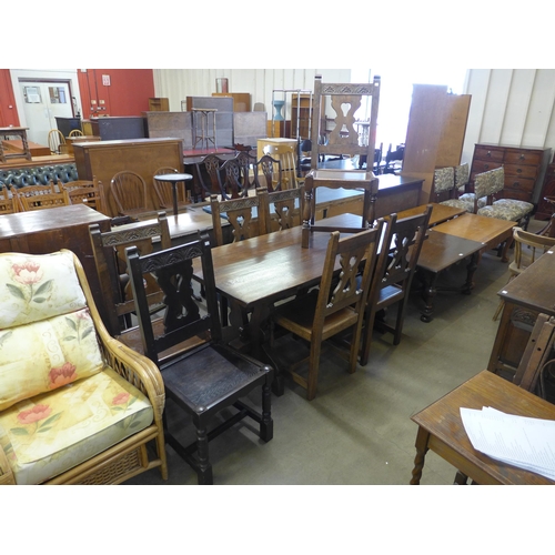 210 - An oak refectory table, seven chairs and a dresser