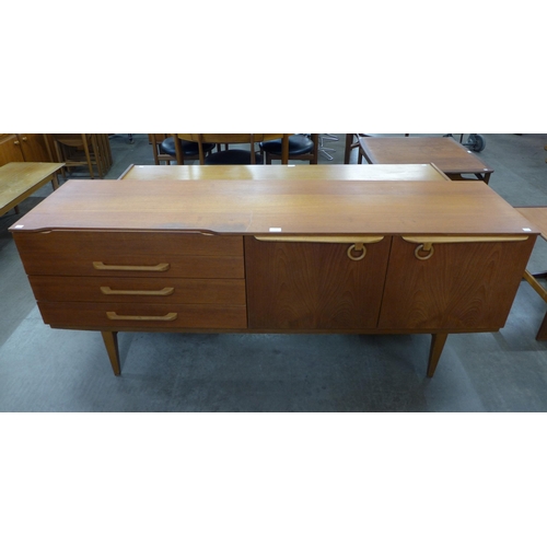 22 - A teak sideboard