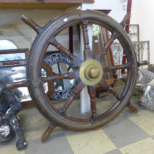 223 - A teak ship's wheel