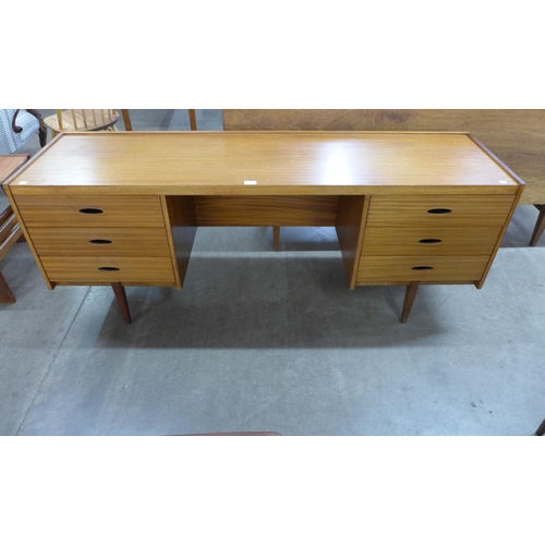 23 - An Austin Suite teak desk