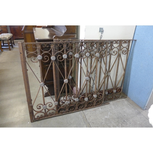 240C - A pair of French wrought iron and lead gates