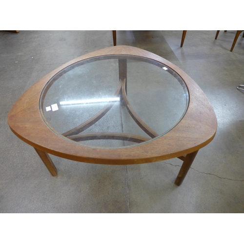 25 - A Nathan teak and glass topped coffee table