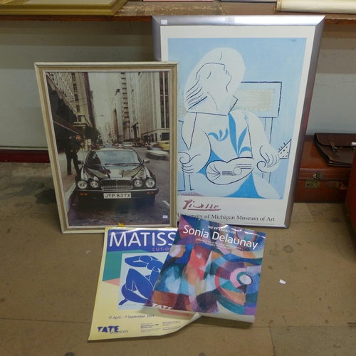 272 - A Pablo Picasso print, two other prints and a print of a vintage Jaguar car