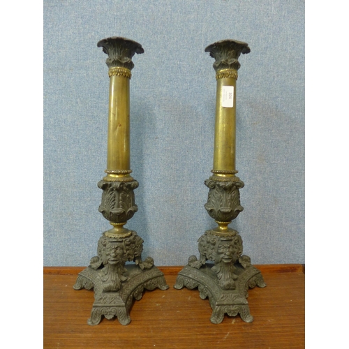 304 - A pair of 19th Century style French brass candlesticks