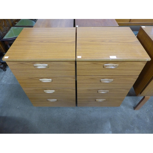 55 - A pair of teak chests of drawers