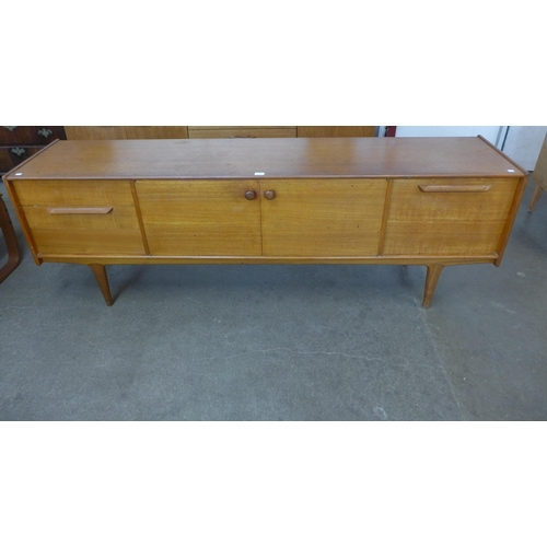 57 - A teak sideboard