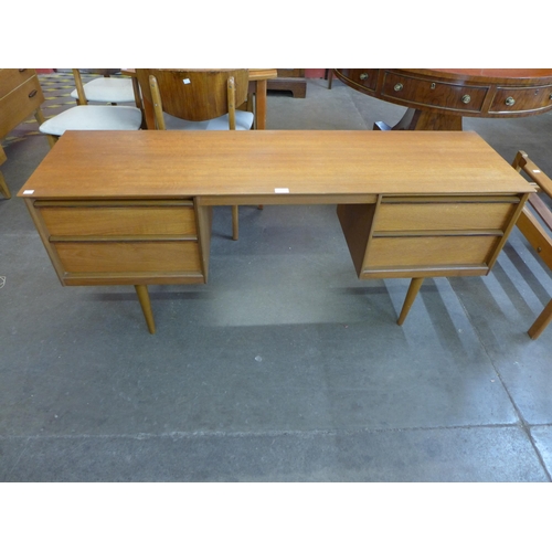 60 - An Austin Suite teak desk