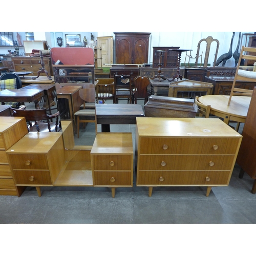 64 - A Meredew oak and afromosia chest of drawers and dressing table