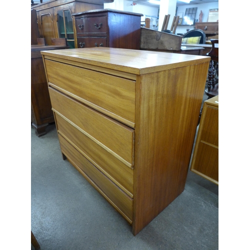 65 - A teak chest of drawers