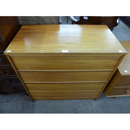 65 - A teak chest of drawers