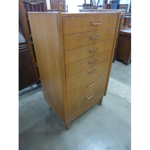 68 - A teak chest of drawers