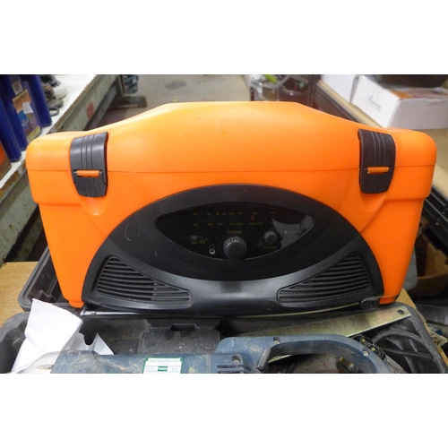 2067 - A Power Craft 240v angle grinder in case and rock cooler radio