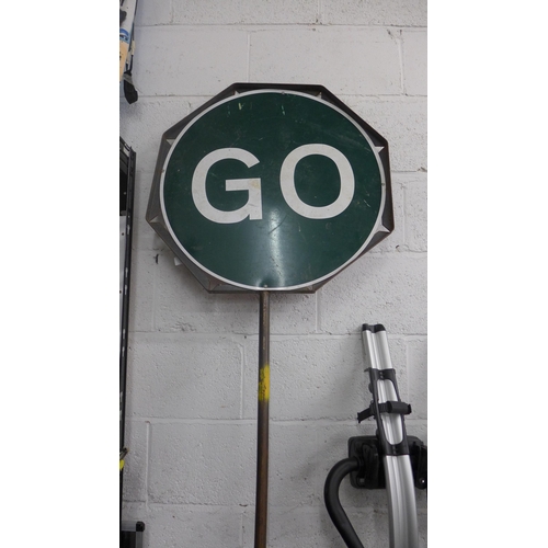 2076 - A metal stop/go lollypop sign