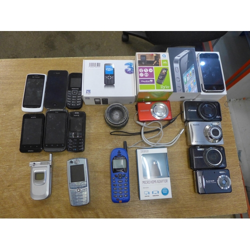 2135 - A quantity of mobile phones including iPhone 4 (boxed), original iPhone, Sony Ericsson, Nokia, Samsu... 