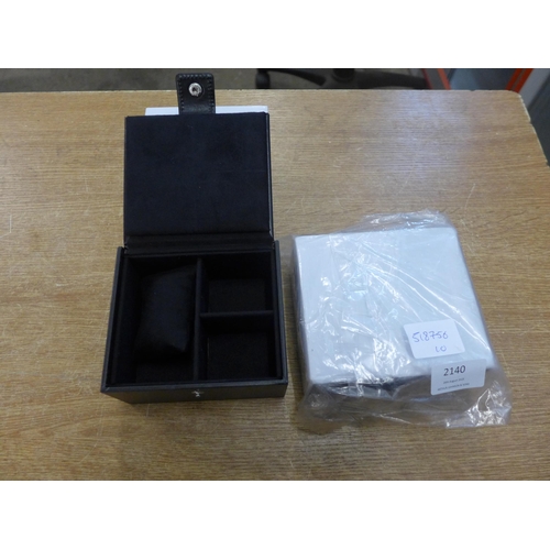 2140 - 2 Small padded jewellery boxes in black - sealed