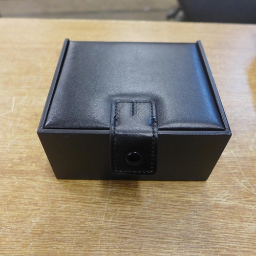 2140 - 2 Small padded jewellery boxes in black - sealed