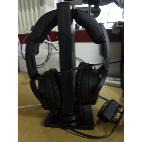 2168 - A pair of Sony wireless headphones and stand