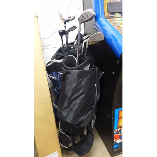 2234 - 2 Golf bags with clubs