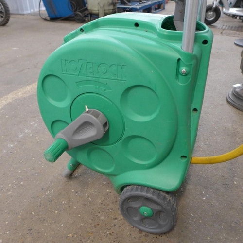 2270 - A Hozelock hose pipe and reel