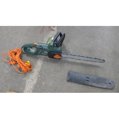 2286 - A Black & decker chainsaw with spare blade, tools and oil (model GK11640T)