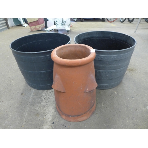 2304 - A clay chimney pot and two Smithy planters