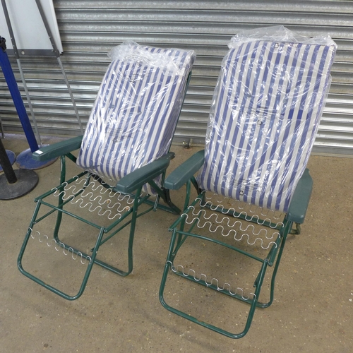 2309 - 2 Folding sun loungers with seat cushions