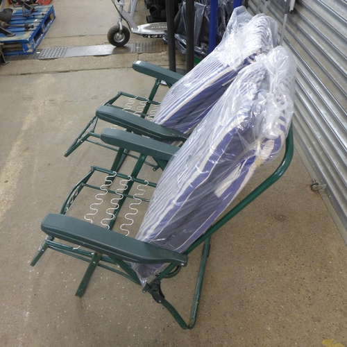 2309 - 2 Folding sun loungers with seat cushions