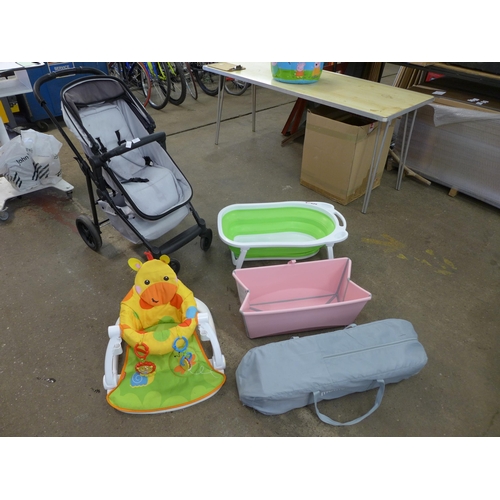 2317 - An IckleBaba push chair and a job lot of baby items