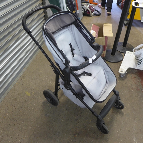 2317 - An IckleBaba push chair and a job lot of baby items